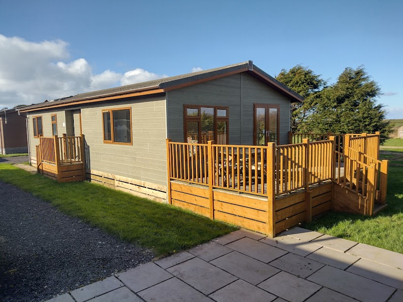 Apple Blossom Lodge and its timber deck